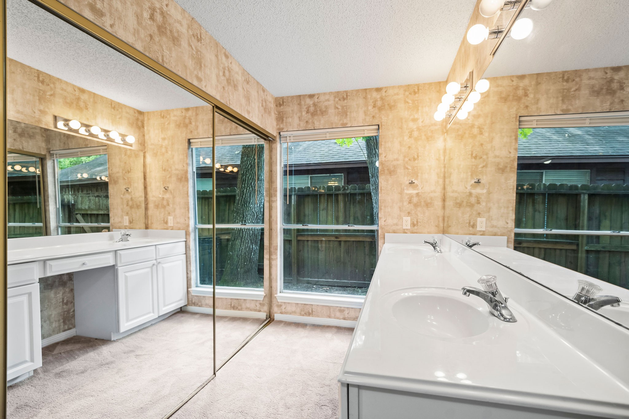 22 South Rain Forest Court Spring, TX 77380 - Photo 19 of 29 a en suite bathroom with a sink and mirror