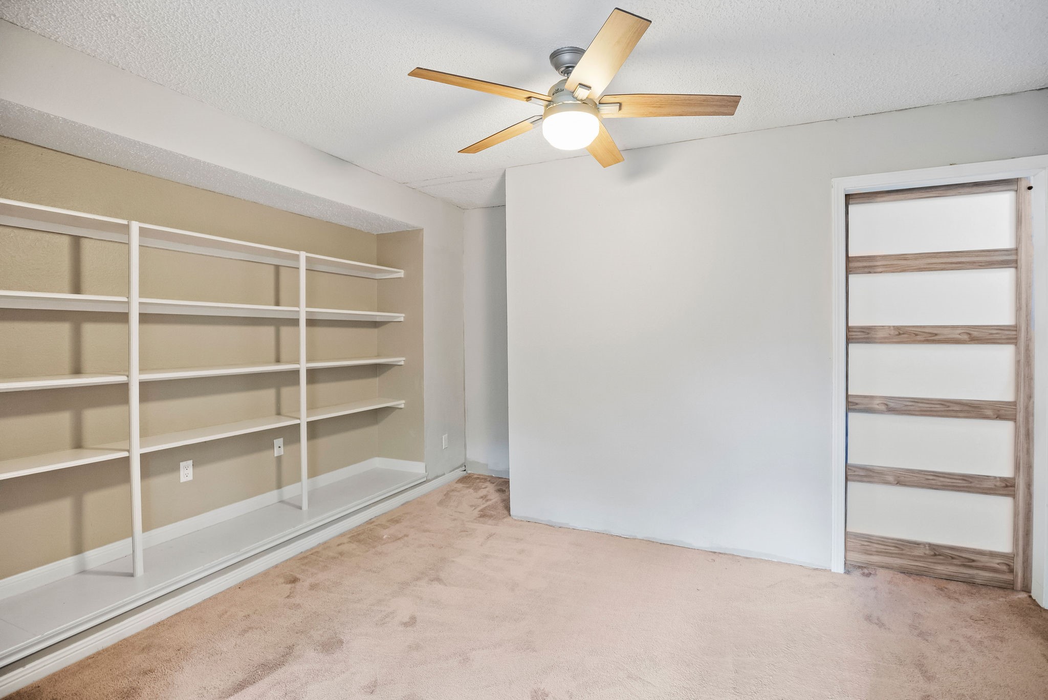 22 South Rain Forest Court Spring, TX 77380 - Photo 26 of 29 a view of an empty room with a window