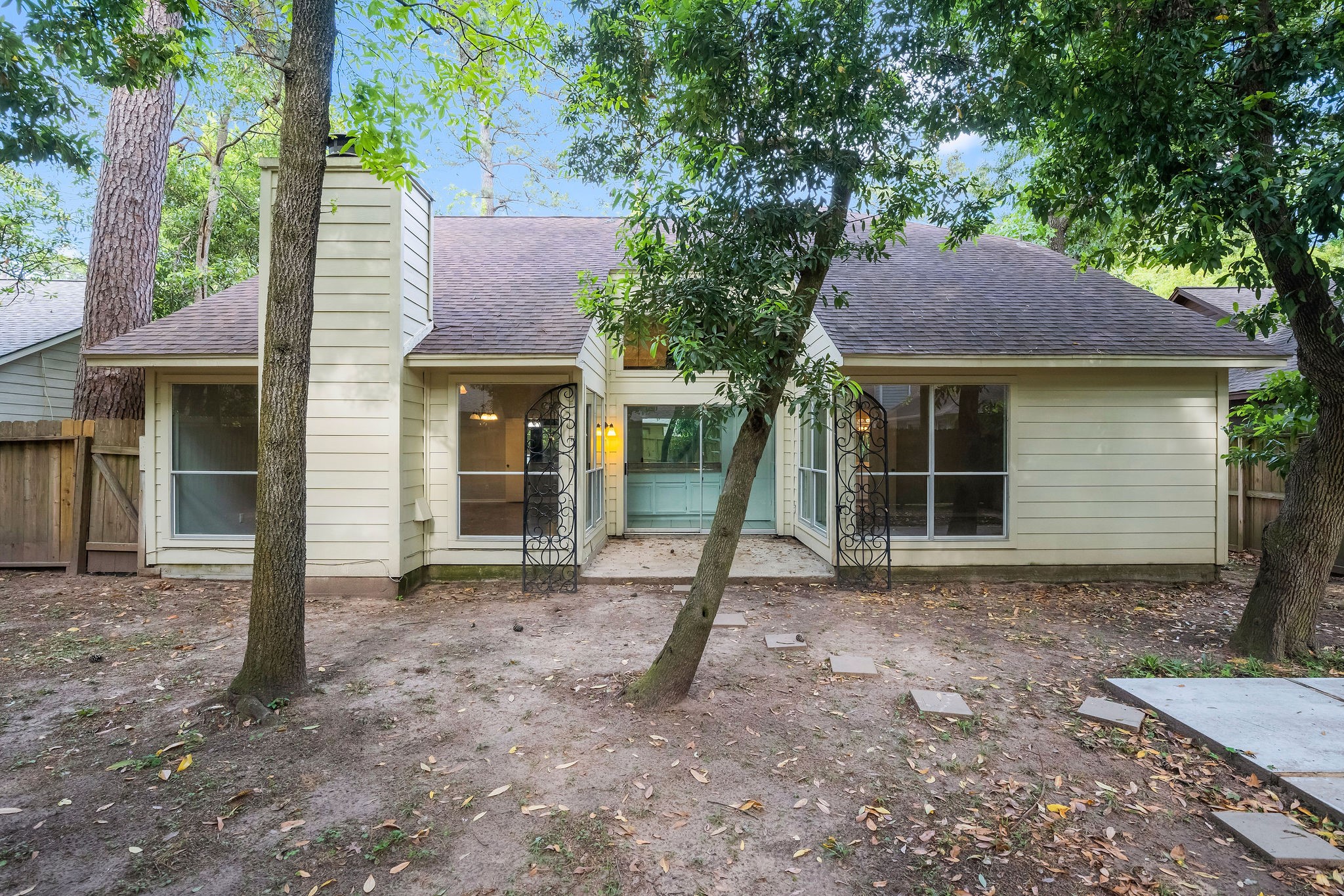 22 South Rain Forest Court Spring, TX 77380 - Photo 29 of 29 a house that has a tree in front of it