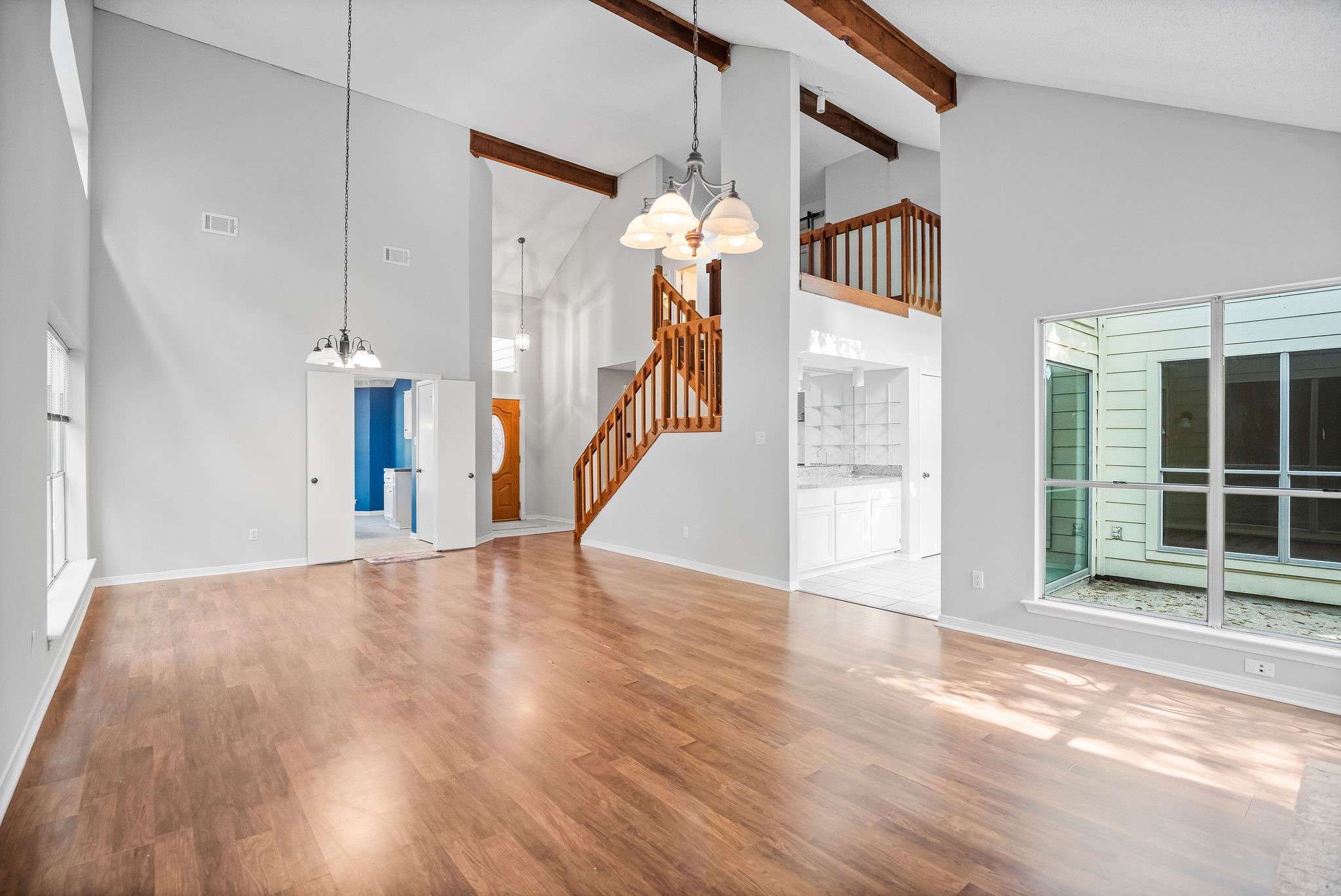 22 South Rain Forest Court Spring, TX 77380 - Photo 4 of 29 a view of an entryway with wooden floor