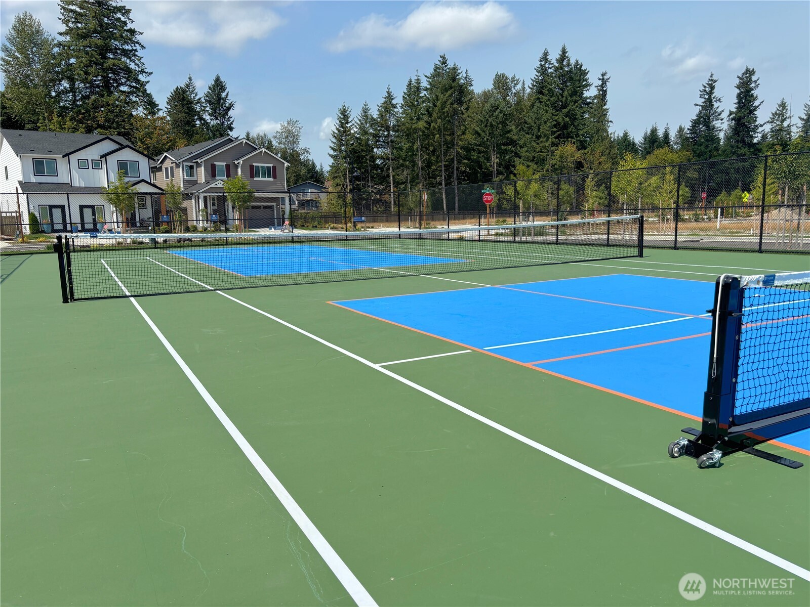 34124 Emerald Ridge Avenue Southeast Black Diamond, WA 98010 - Photo 23 of 24 a view of a tennis court