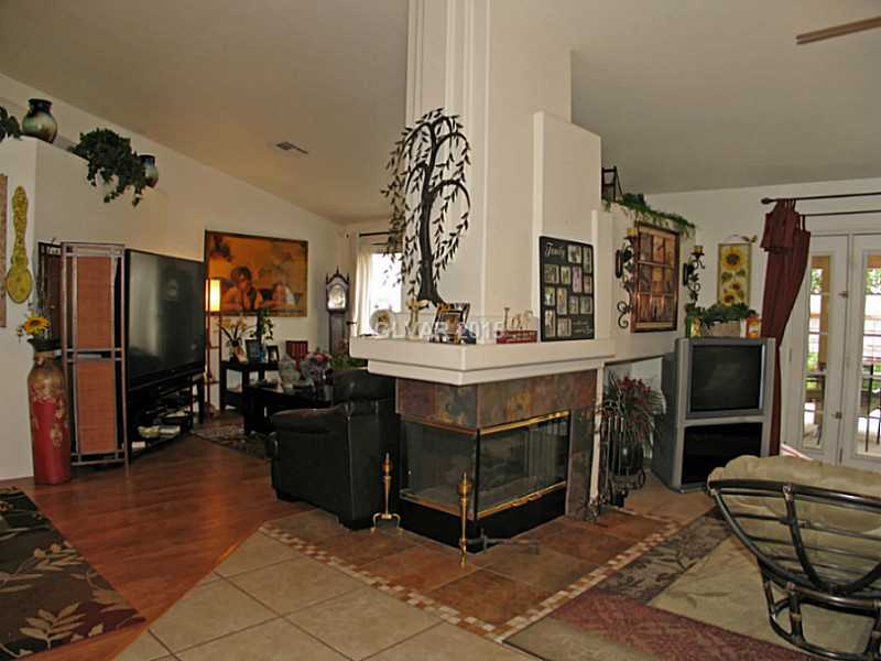 114 Rancho Maderas Way Henderson, NV 89002 - Photo 7 of 34 Property Photo. THREE WAY FIREPLACE