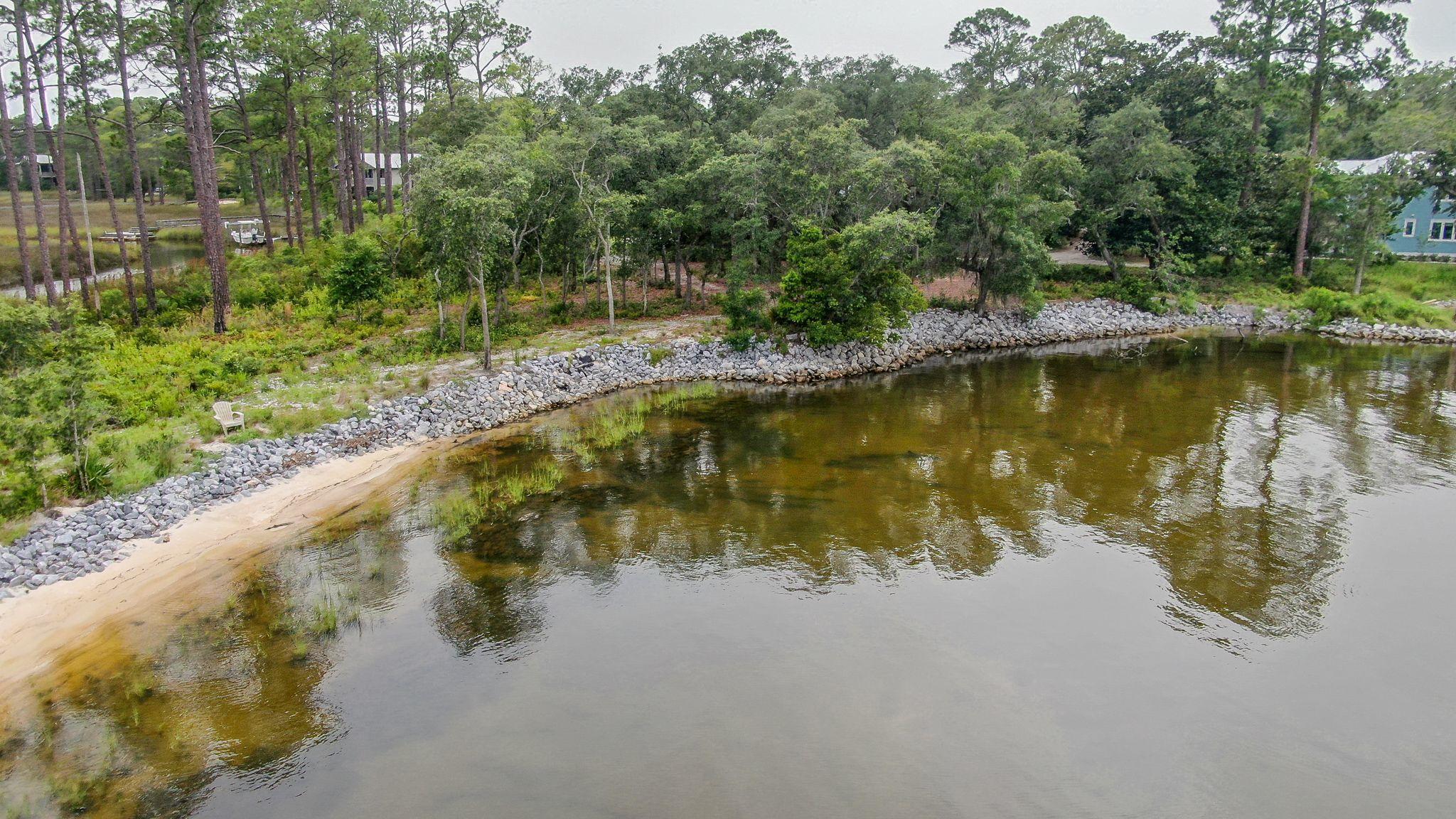 0 Native Tree Lane Santa Rosa Beach, FL 32459 - Photo 10 of 10 a view of a lake with a yard and mountain view