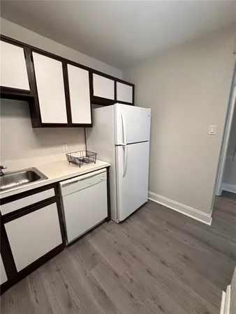 a bathroom with a toilet a sink and a bathtub