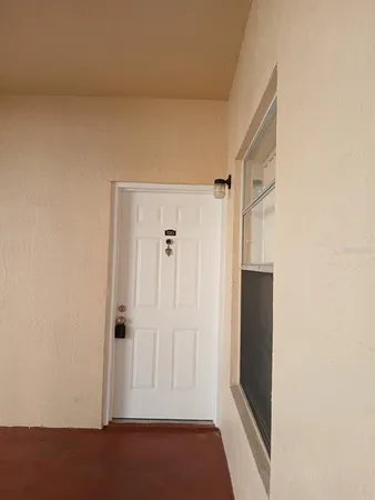 a view of hallway with closet