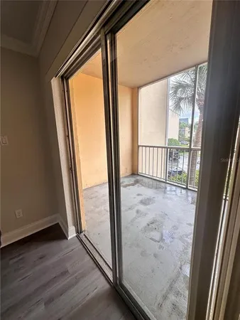 a view of a car parked in front of a house