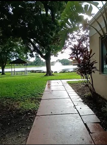 a view of a street with cars