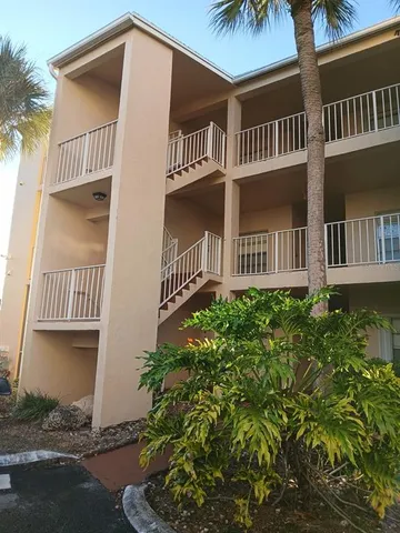 a car parked in front of a house