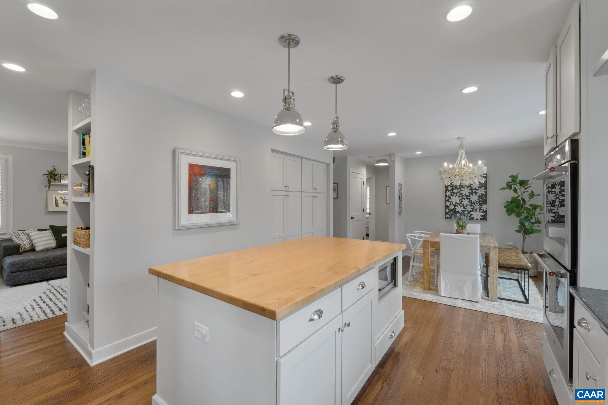 118 Buckingham Road Charlottesville, VA 22903 - Photo 11 of 59 a large kitchen with a table and chairs