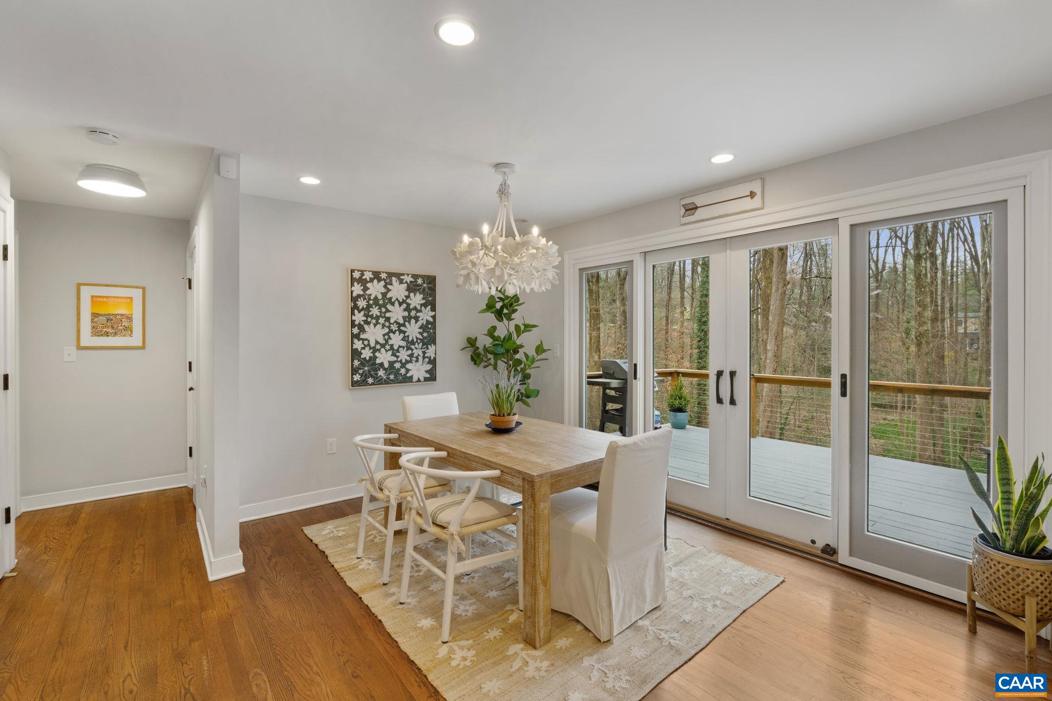 118 Buckingham Road Charlottesville, VA 22903 - Photo 16 of 59 a view of a dining room with furniture window and wooden floor