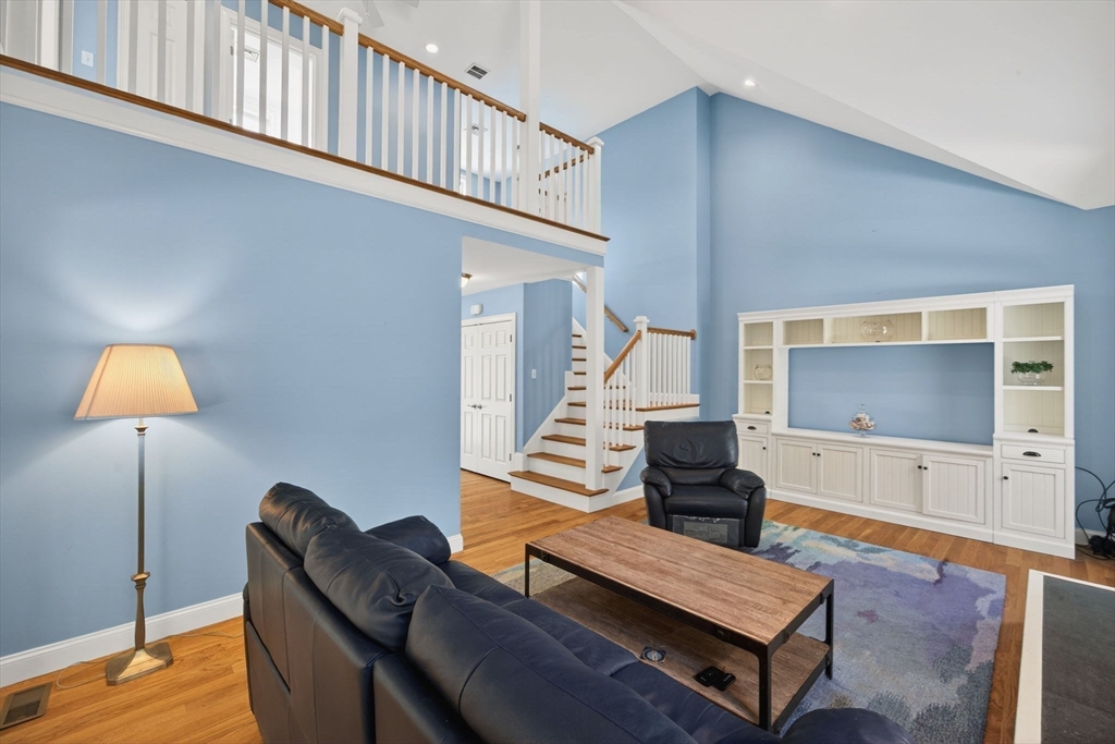 26 Crosswinds Way Falmouth, MA 02536 - Photo 17 of 41 a living room with furniture and a flat screen tv