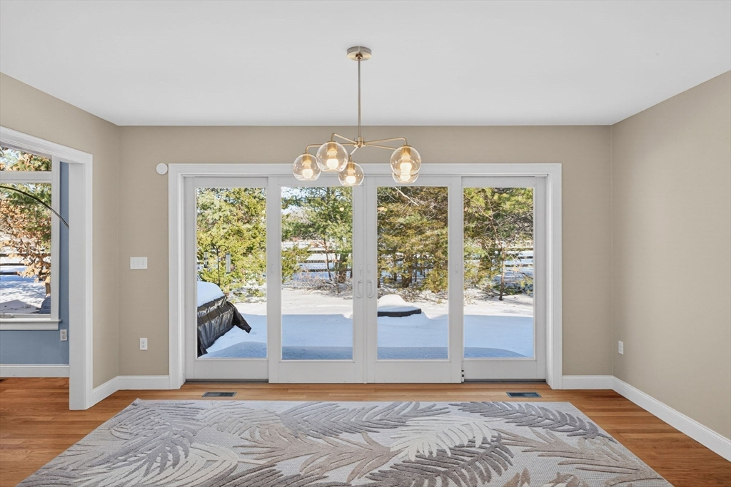 26 Crosswinds Way Falmouth, MA 02536 - Photo 20 of 41 a view of a room with window wooden floor and front door