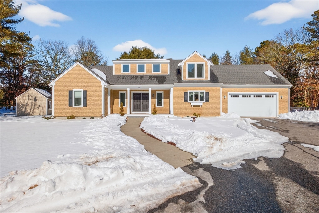 26 Crosswinds Way Falmouth, MA 02536 - Photo 2 of 41 a front view of a house with a yard