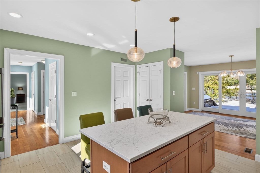 26 Crosswinds Way Falmouth, MA 02536 - Photo 25 of 41 a kitchen with a table and chairs in it