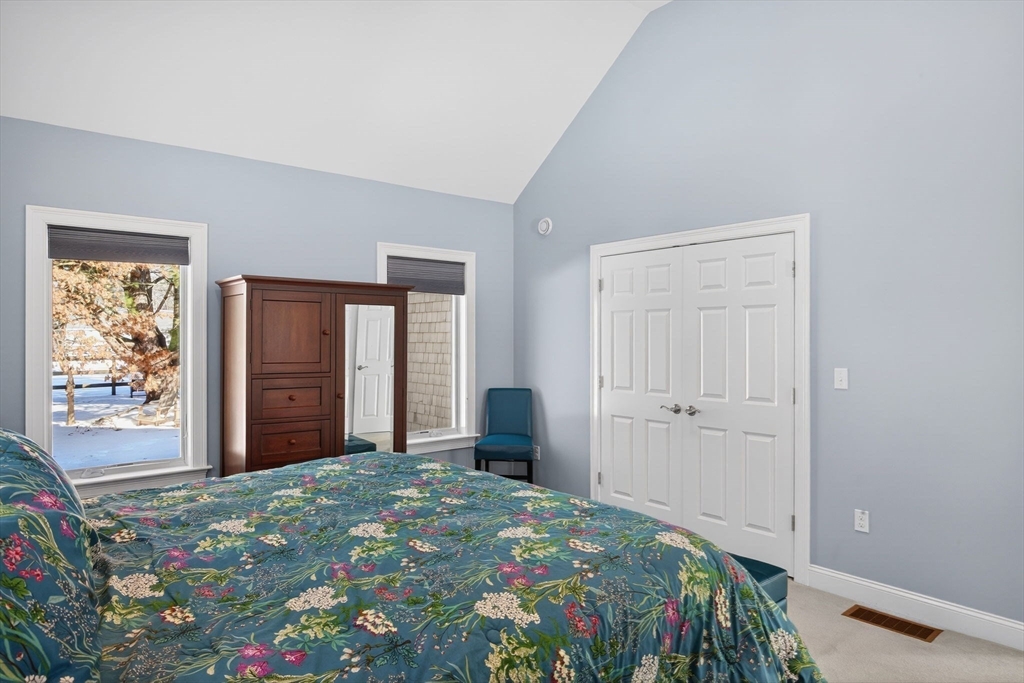 26 Crosswinds Way Falmouth, MA 02536 - Photo 28 of 41 a bedroom with a bed and a window