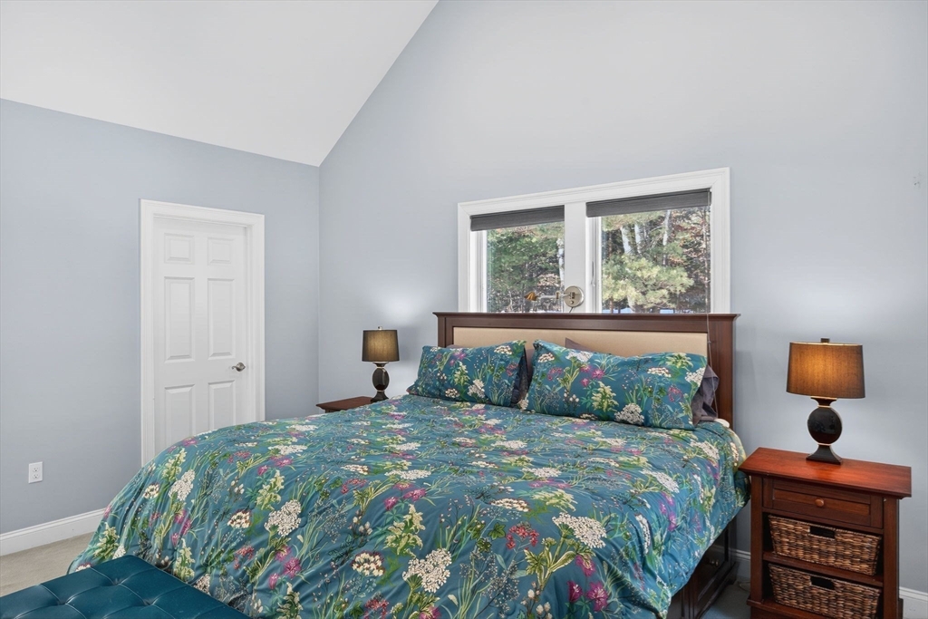 26 Crosswinds Way Falmouth, MA 02536 - Photo 29 of 41 a bedroom with a bed and window