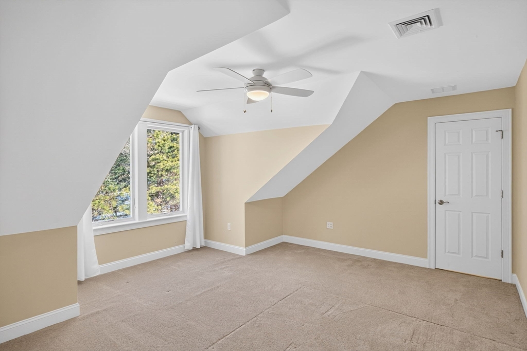 26 Crosswinds Way Falmouth, MA 02536 - Photo 34 of 41 an empty room with windows and fan