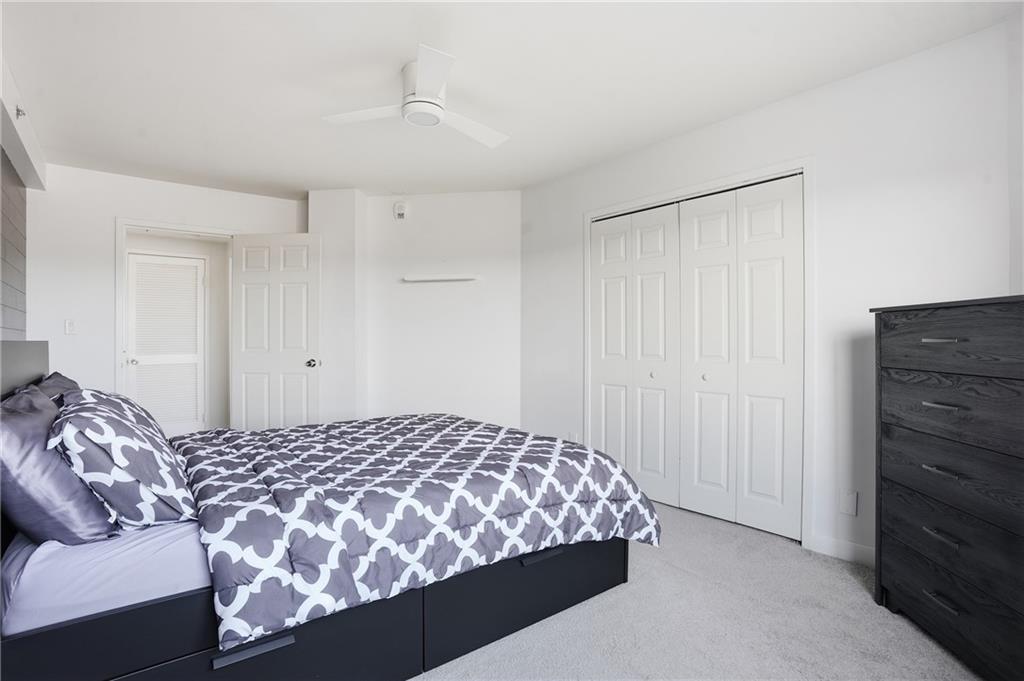 1501 Clairmont Road, Unit 1316 Decatur, GA 30033 - Photo 11 of 25 a bedroom with a bed and a dresser