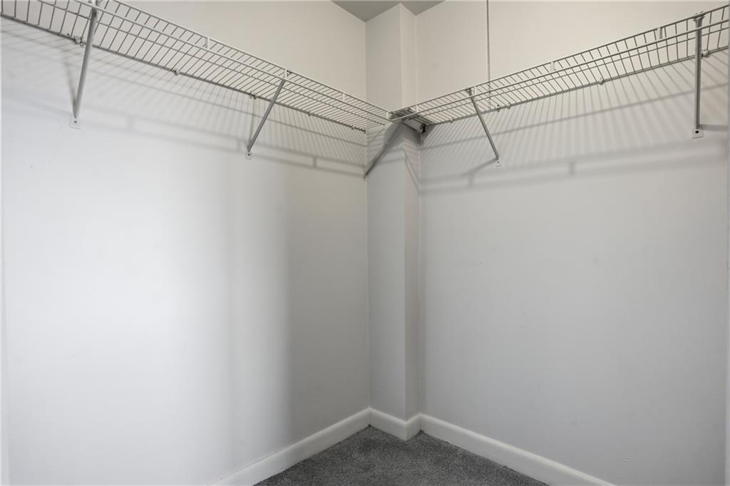 1501 Clairmont Road, Unit 1316 Decatur, GA 30033 - Photo 12 of 25 a view of a room with racks on the wall