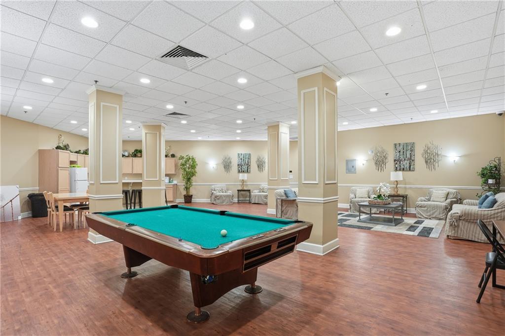 1501 Clairmont Road, Unit 1316 Decatur, GA 30033 - Photo 20 of 25 a room with lots of furniture and view of pool