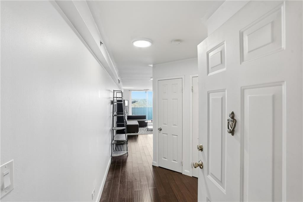 1501 Clairmont Road, Unit 1316 Decatur, GA 30033 - Photo 2 of 25 a view of entryway with livingroom and wooden floor