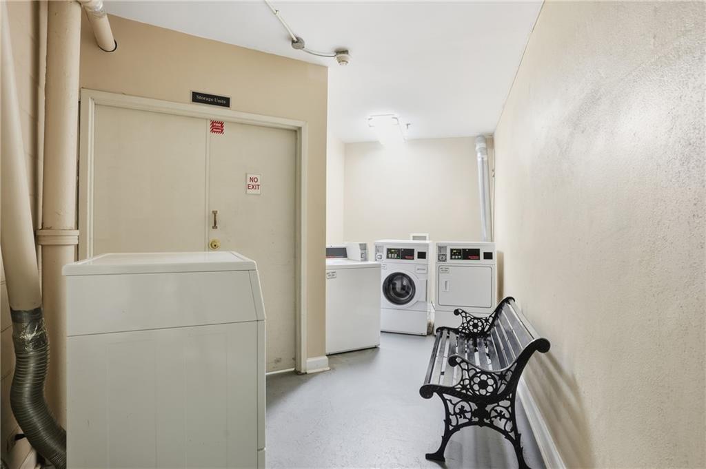 1501 Clairmont Road, Unit 1316 Decatur, GA 30033 - Photo 22 of 25 a bathroom with a sink a toilet and a mirror
