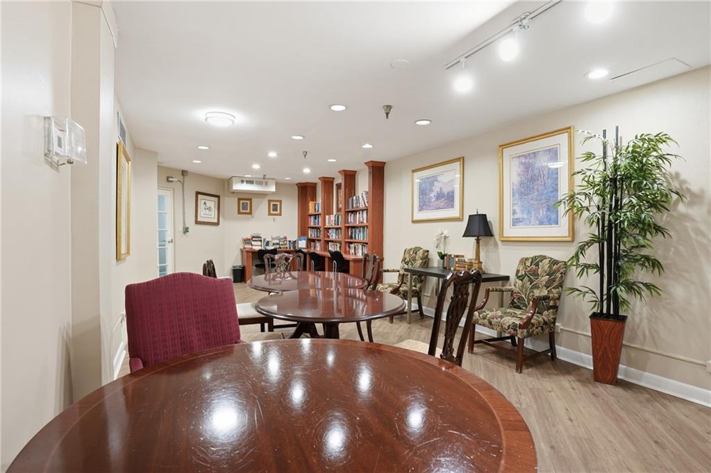 1501 Clairmont Road, Unit 1316 Decatur, GA 30033 - Photo 23 of 25 a living room with lots of furniture and a large window