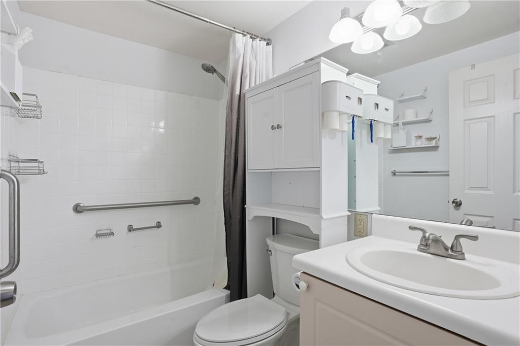 1501 Clairmont Road, Unit 1316 Decatur, GA 30033 - Photo 9 of 25 a bathroom with a sink toilet vanity and shower