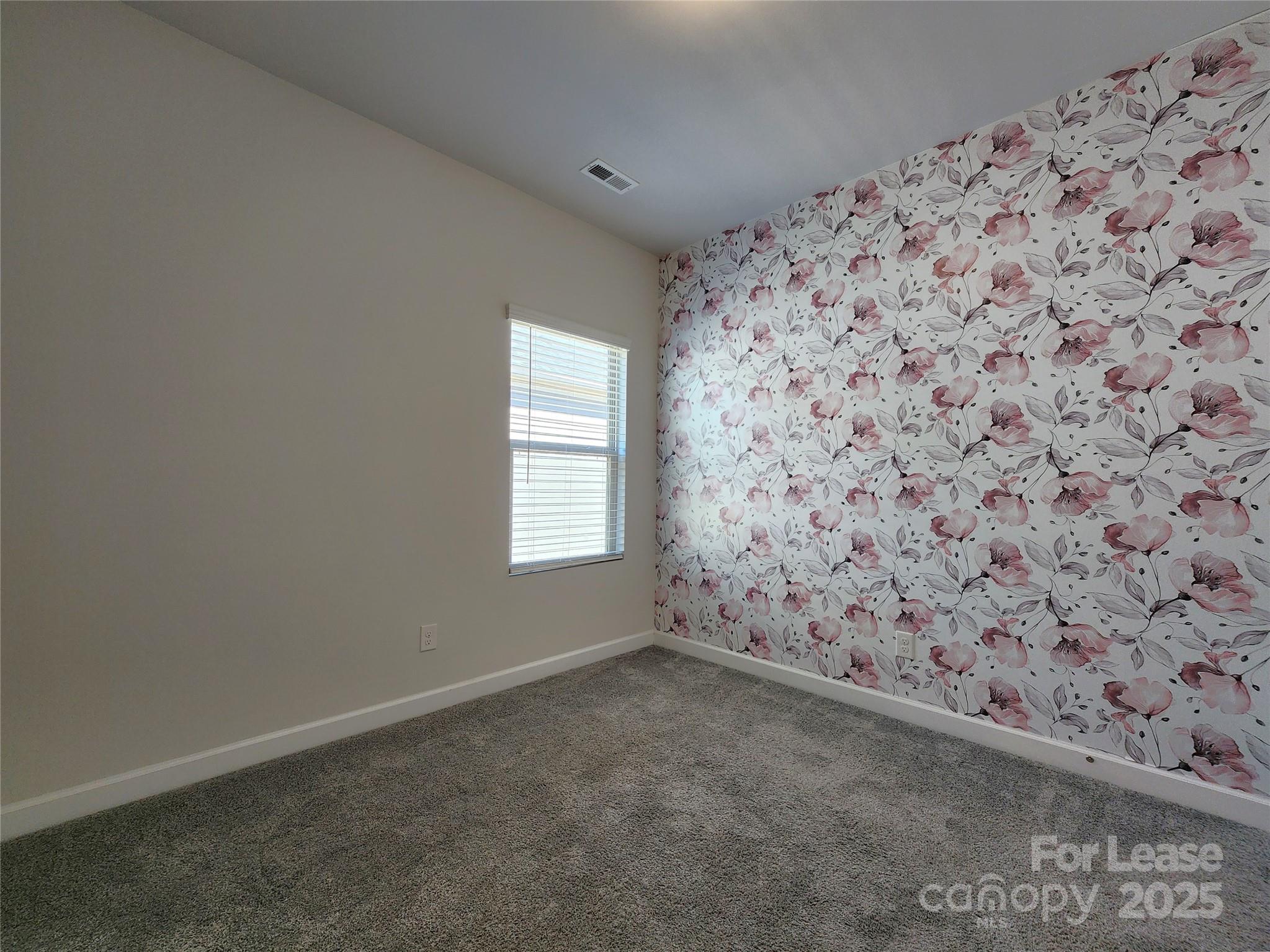 4227 Canopy Creek Drive Denver, NC 28037 - Photo 17 of 33 an empty room with a window