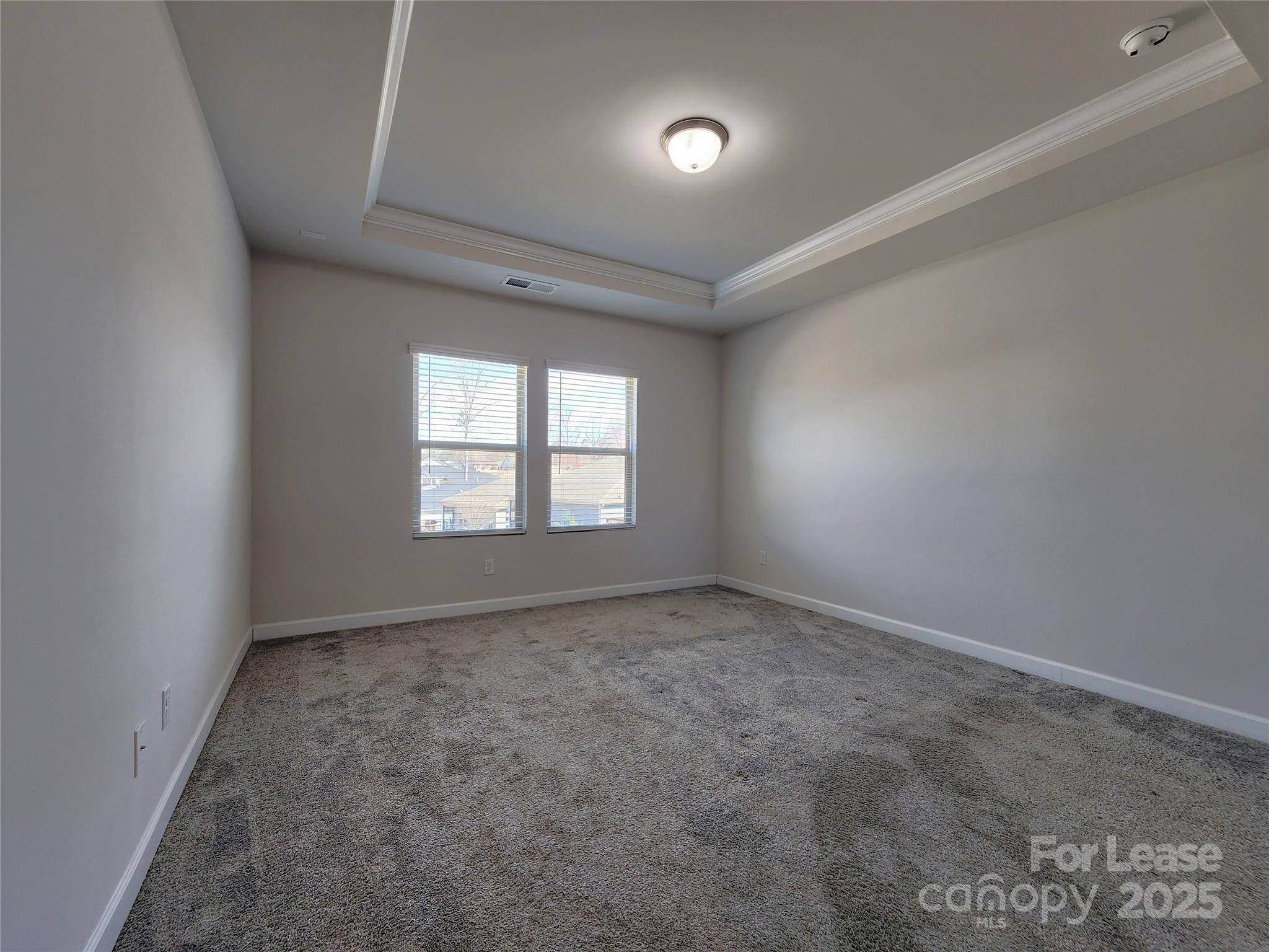 4227 Canopy Creek Drive Denver, NC 28037 - Photo 19 of 33 an empty room with a window