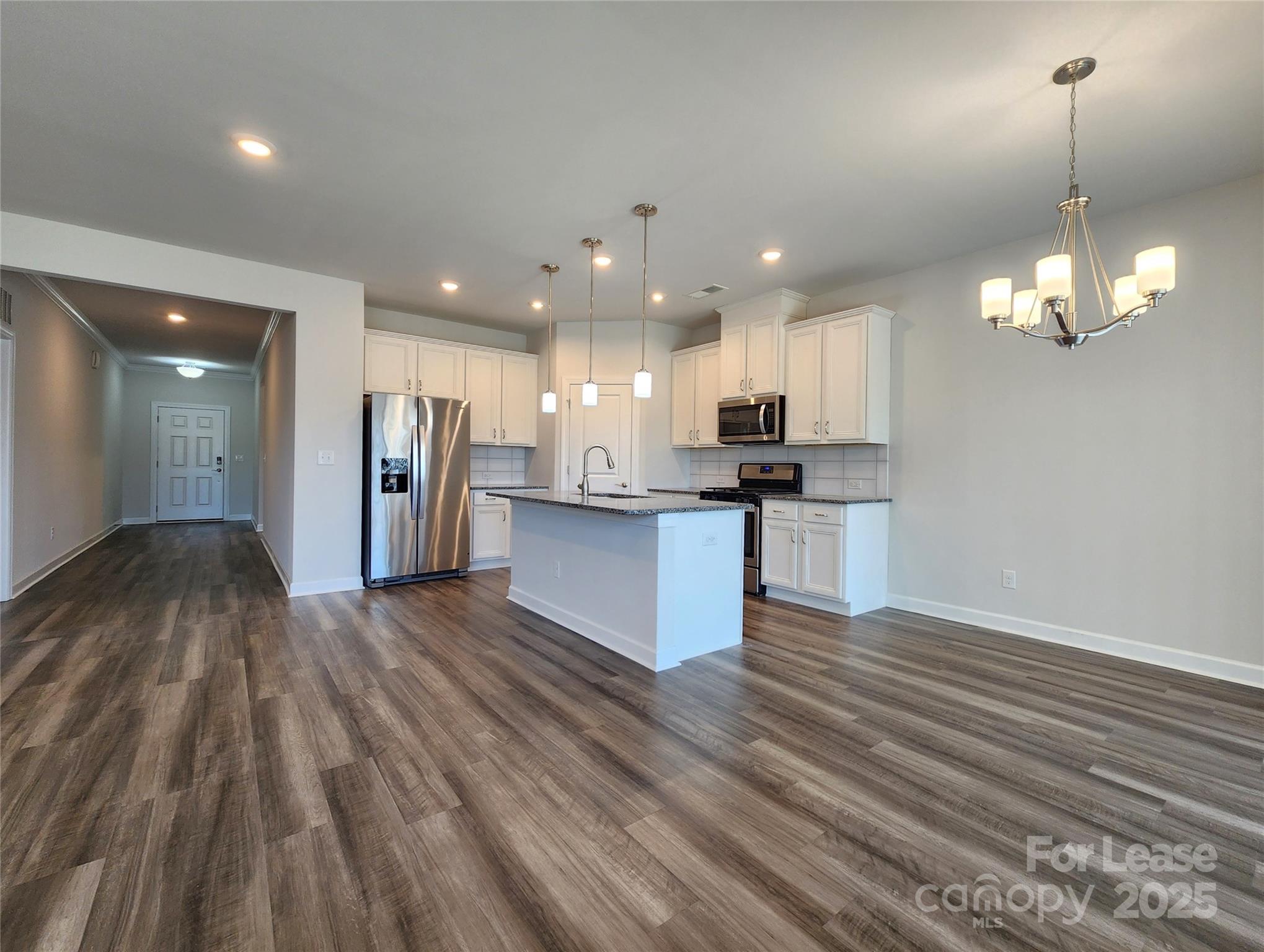 4227 Canopy Creek Drive Denver, NC 28037 - Photo 3 of 33 a view of kitchen with granite countertop cabinets and refrigerator