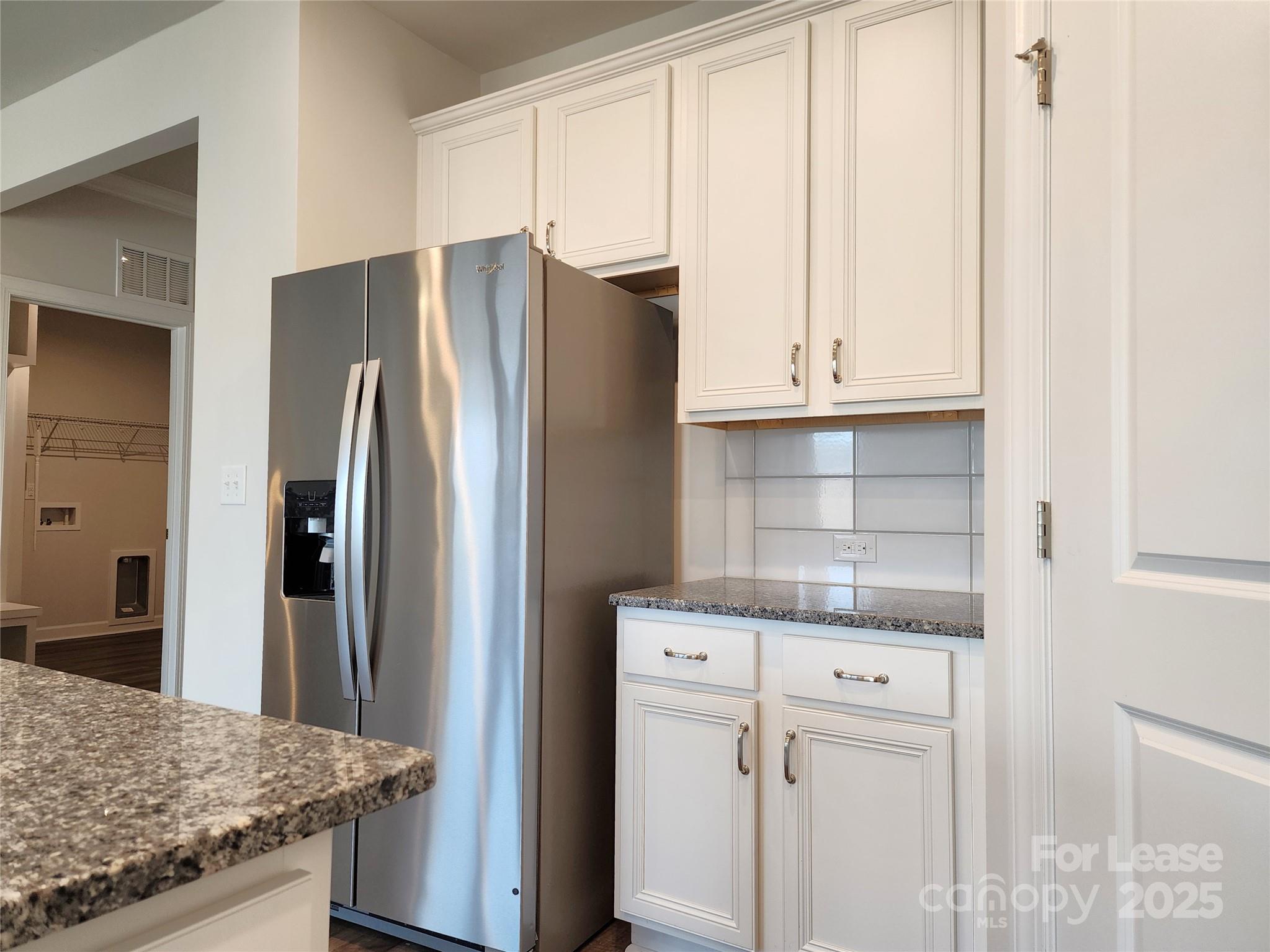 4227 Canopy Creek Drive Denver, NC 28037 - Photo 7 of 33 a kitchen with stainless steel appliances granite countertop a refrigerator and a stove