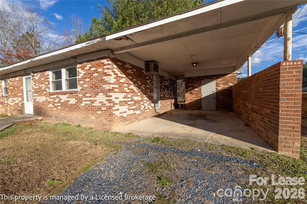 213 Roslyn Road Troy, NC 27371 - Photo 3 of 25 a view of backyard with green space
