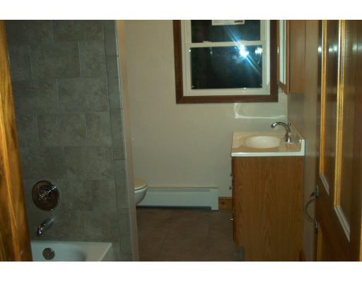 261 Whitney Road Ashby, MA 01431 - Photo 10 of 12 a bathroom with a sink and mirror