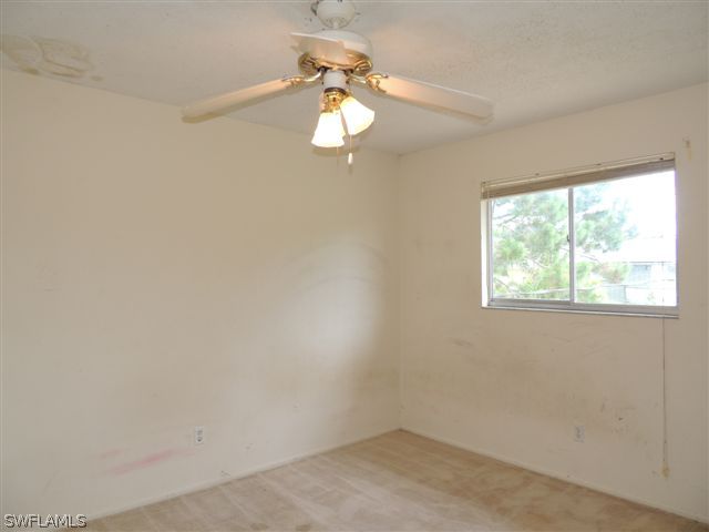 8175 Matanzas Road Fort Myers, FL 33967 - Photo 6 of 12 a view of a window in a room