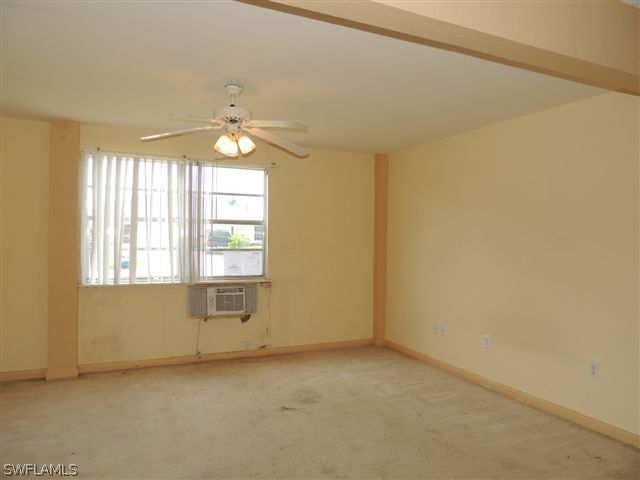 8175 Matanzas Road Fort Myers, FL 33967 - Photo 9 of 12 a view of an empty room with a window