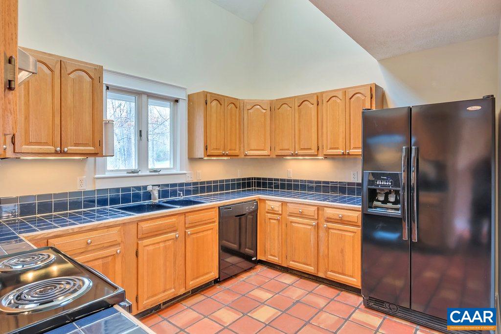 23 Ashton Road Palmyra, VA 22963 - Photo 12 of 27 a kitchen with stainless steel appliances granite countertop a refrigerator and a sink