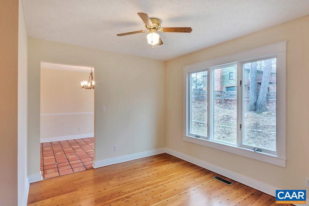 23 Ashton Road Palmyra, VA 22963 - Photo 8 of 27 a view of an empty room with window and cabinet area