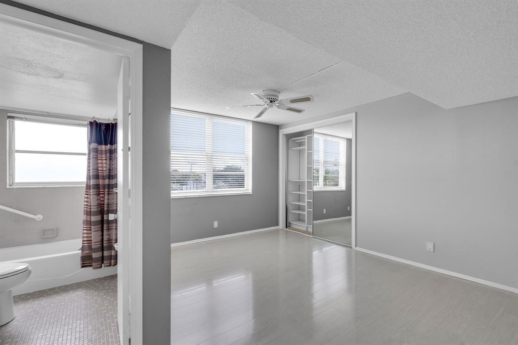 4020 West Palm Aire Drive, Unit 312 Pompano Beach, FL 33069 - Photo 15 of 36 a view of an empty room with a window