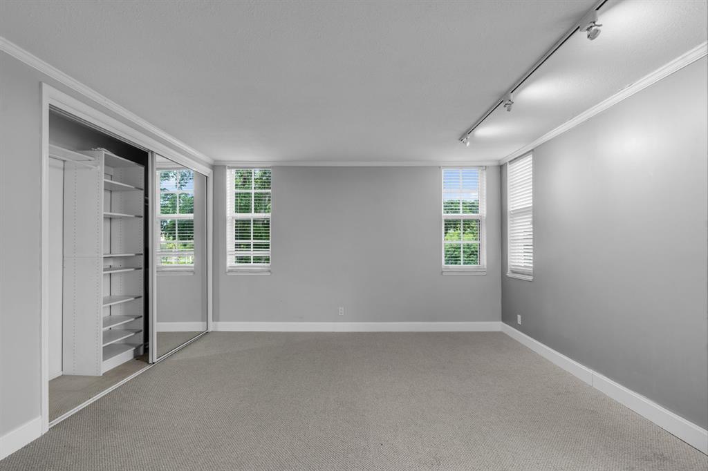 4020 West Palm Aire Drive, Unit 312 Pompano Beach, FL 33069 - Photo 18 of 36 an empty room with windows