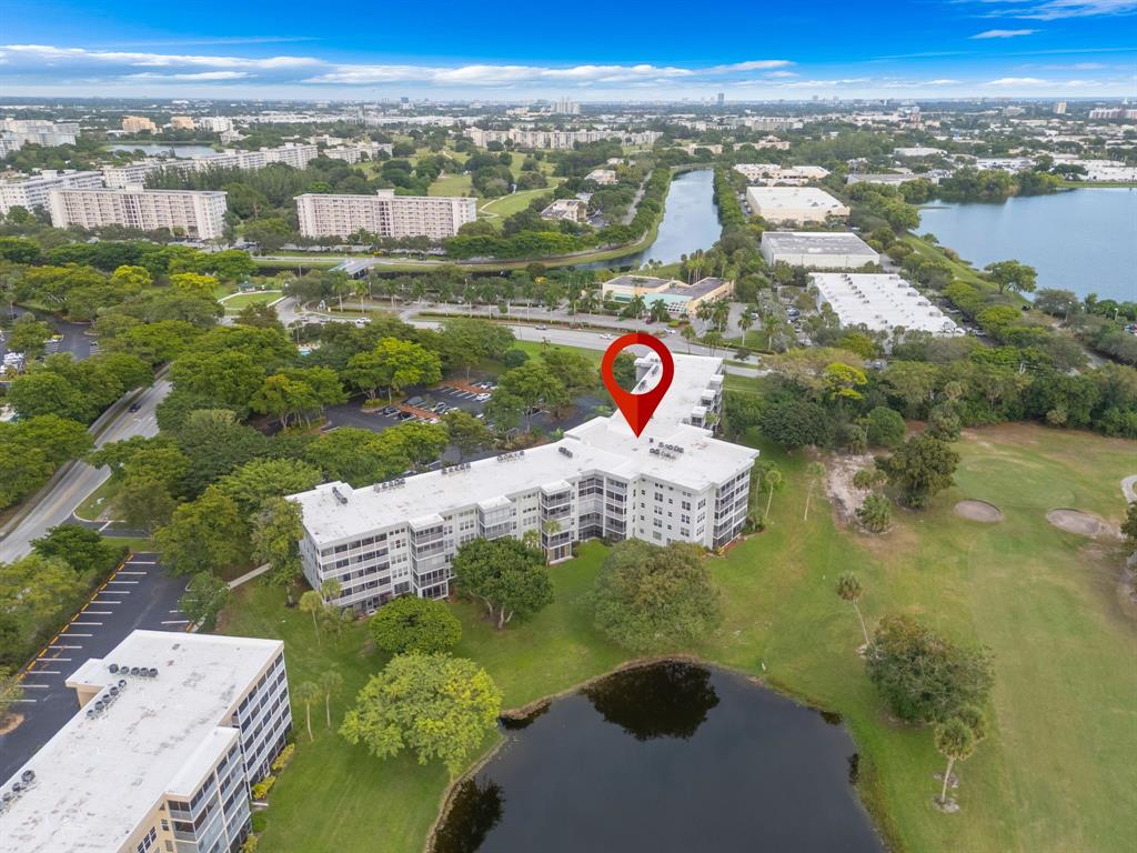 4020 West Palm Aire Drive, Unit 312 Pompano Beach, FL 33069 - Photo 25 of 36 a view of a city