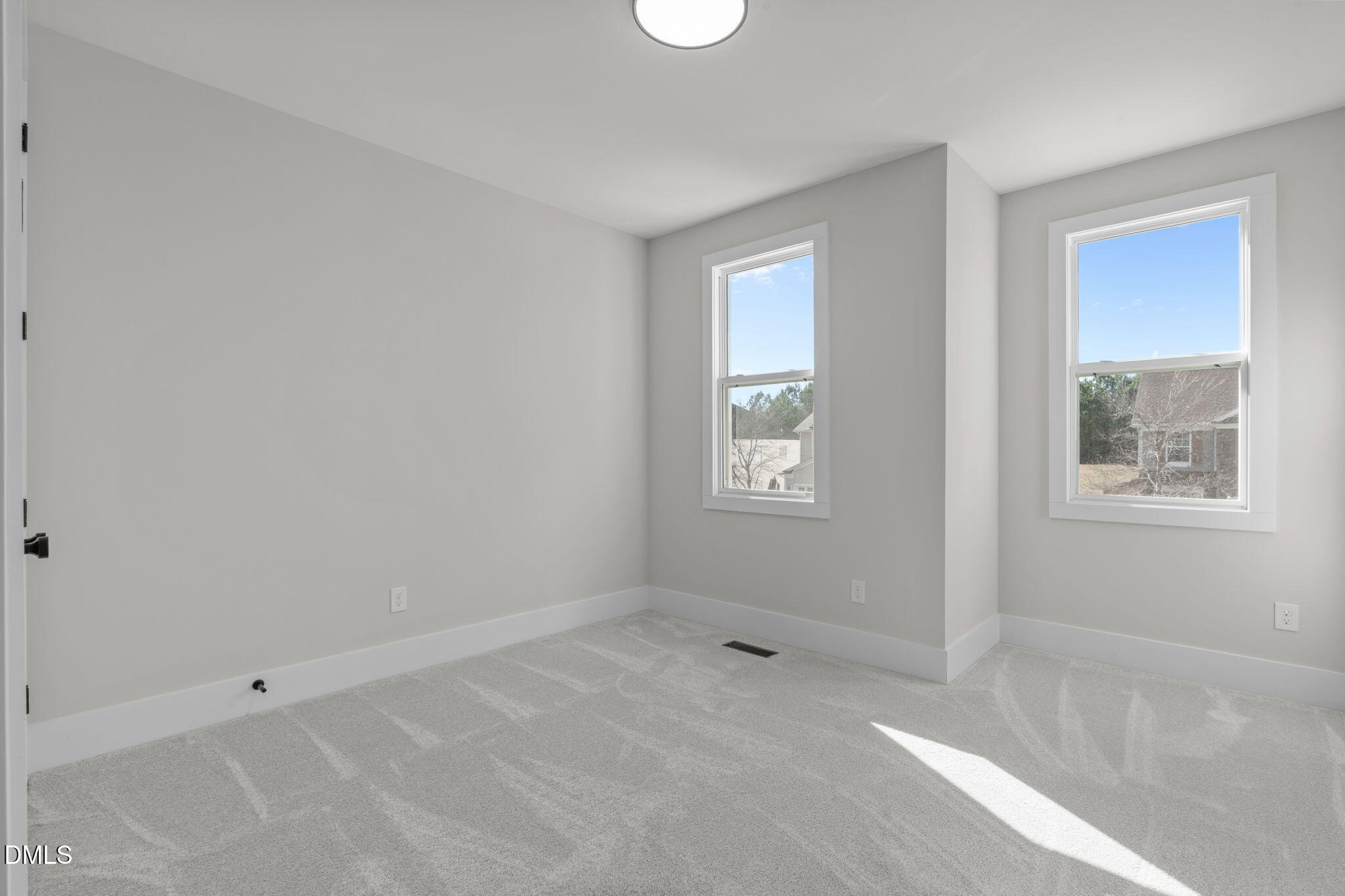 639 Conover Road, Unit B Durham, NC 27703 - Photo 37 of 48 an empty room with windows