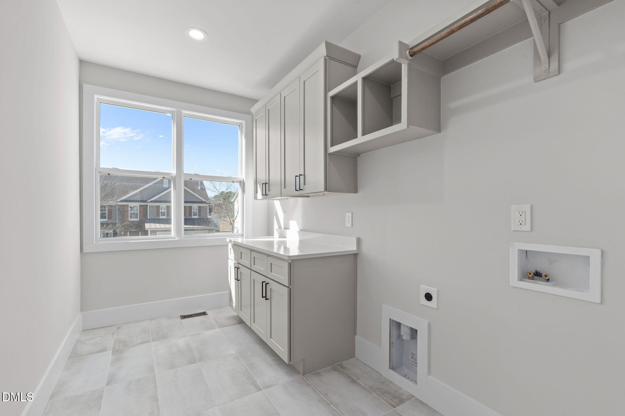 639 Conover Road, Unit B Durham, NC 27703 - Photo 38 of 48 a kitchen with stainless steel appliances granite countertop a sink and cabinets with wooden floor