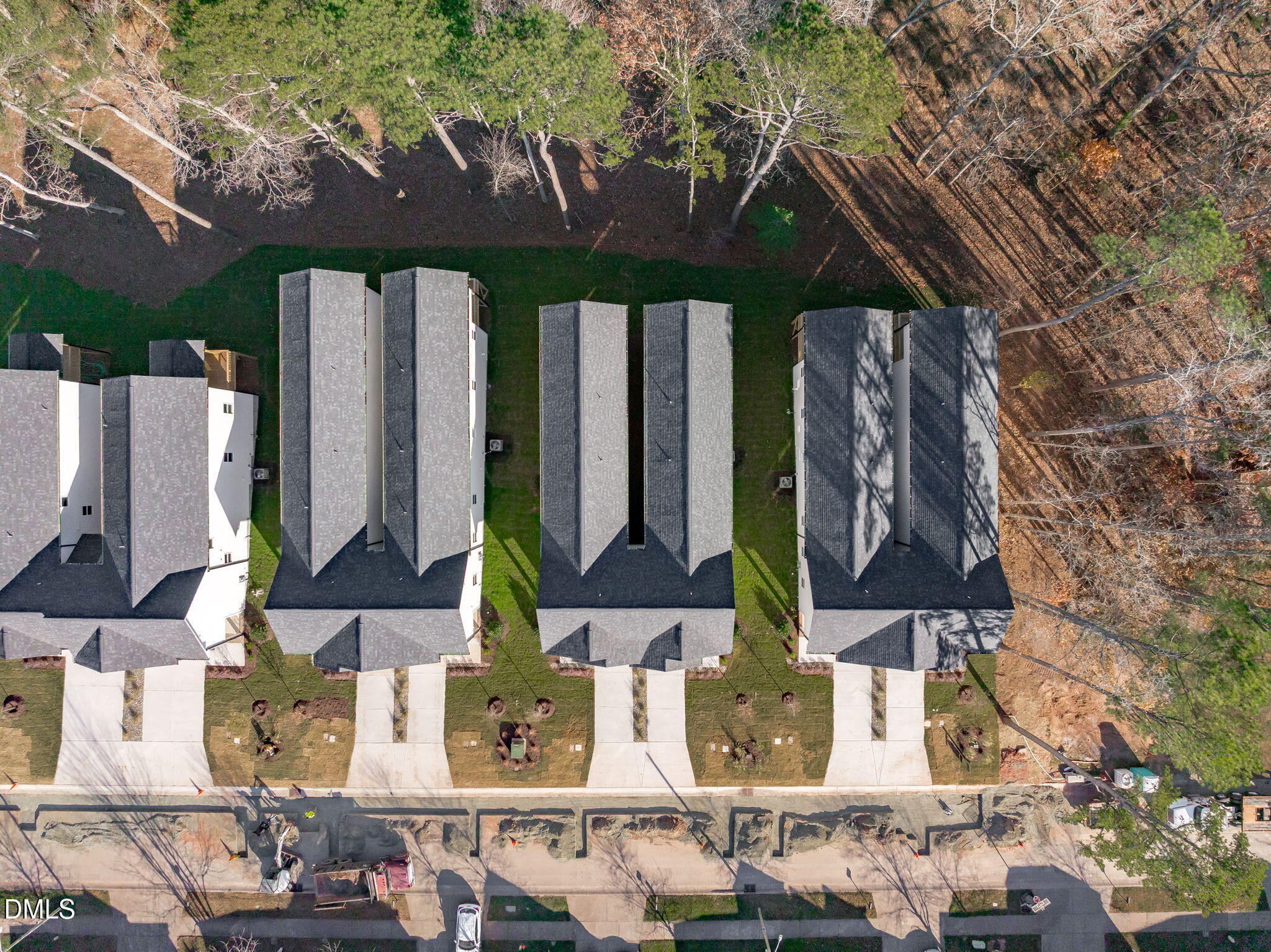 639 Conover Road, Unit B Durham, NC 27703 - Photo 46 of 48 a couple of table and chairs in front of building