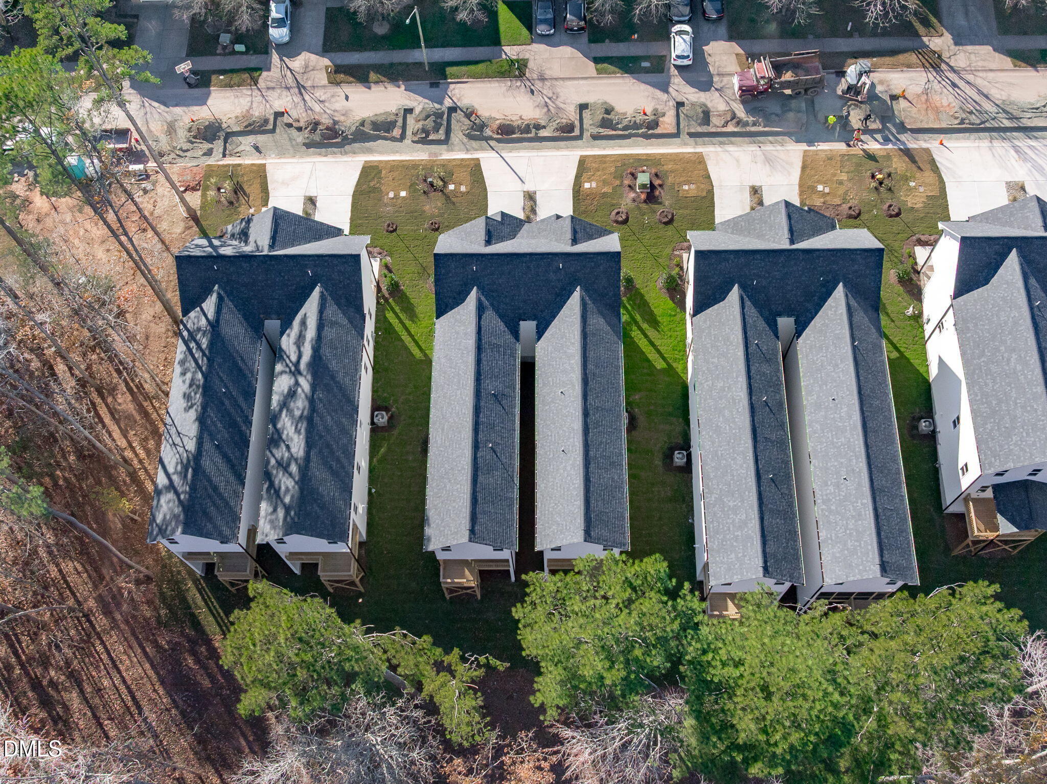 639 Conover Road, Unit B Durham, NC 27703 - Photo 47 of 48 a view of a house with large windows and plants