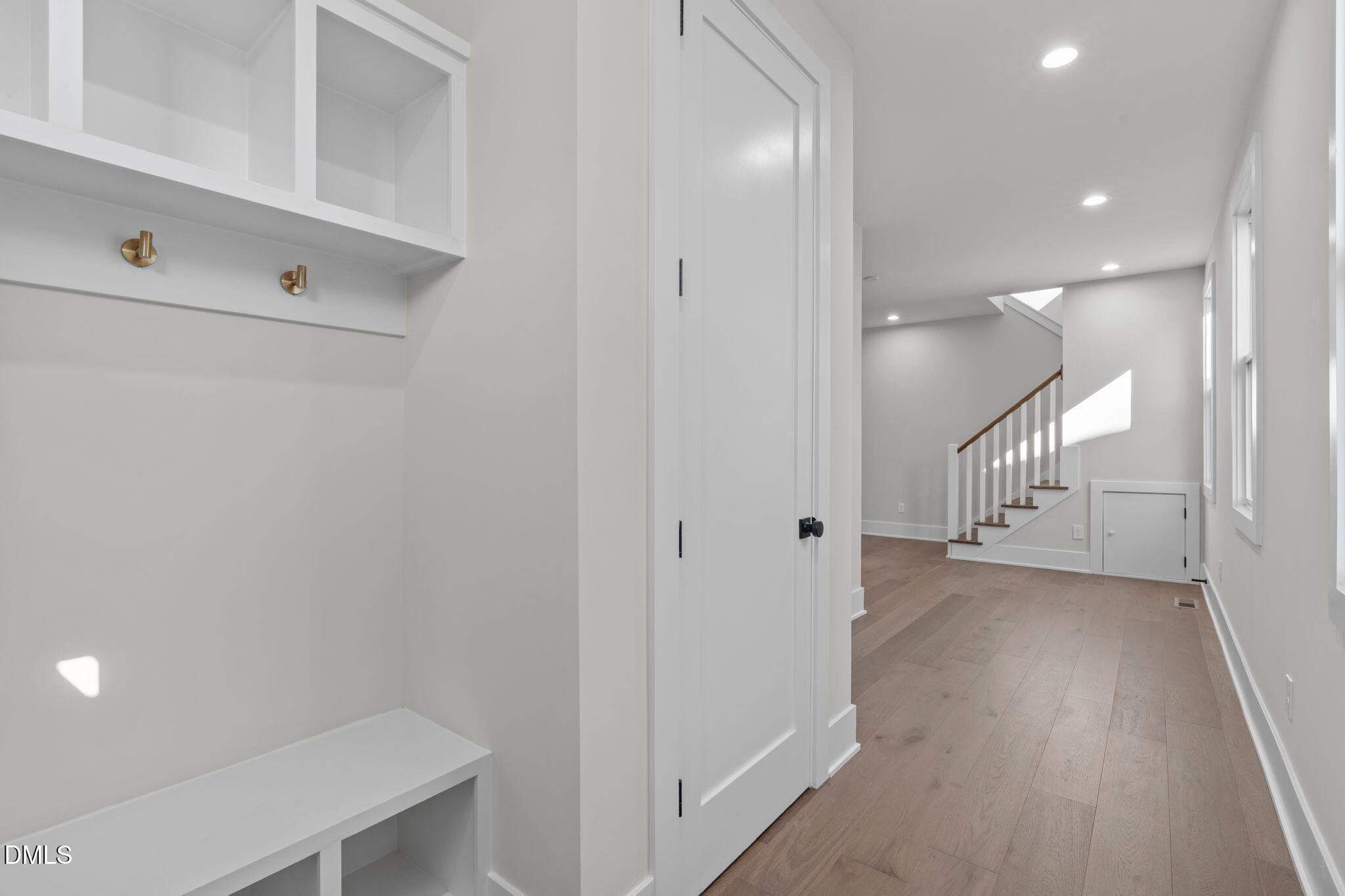639 Conover Road, Unit B Durham, NC 27703 - Photo 9 of 48 a view of a hallway with wooden floor