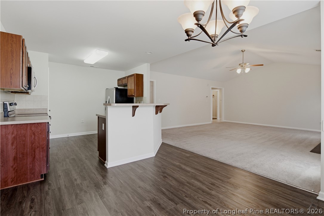 325 Ranier Drive Raeford, NC 28376 - Photo 15 of 50 DINING AREA/KITCHEN/LIVING ROOM