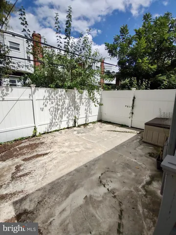 a view of a backyard of a house