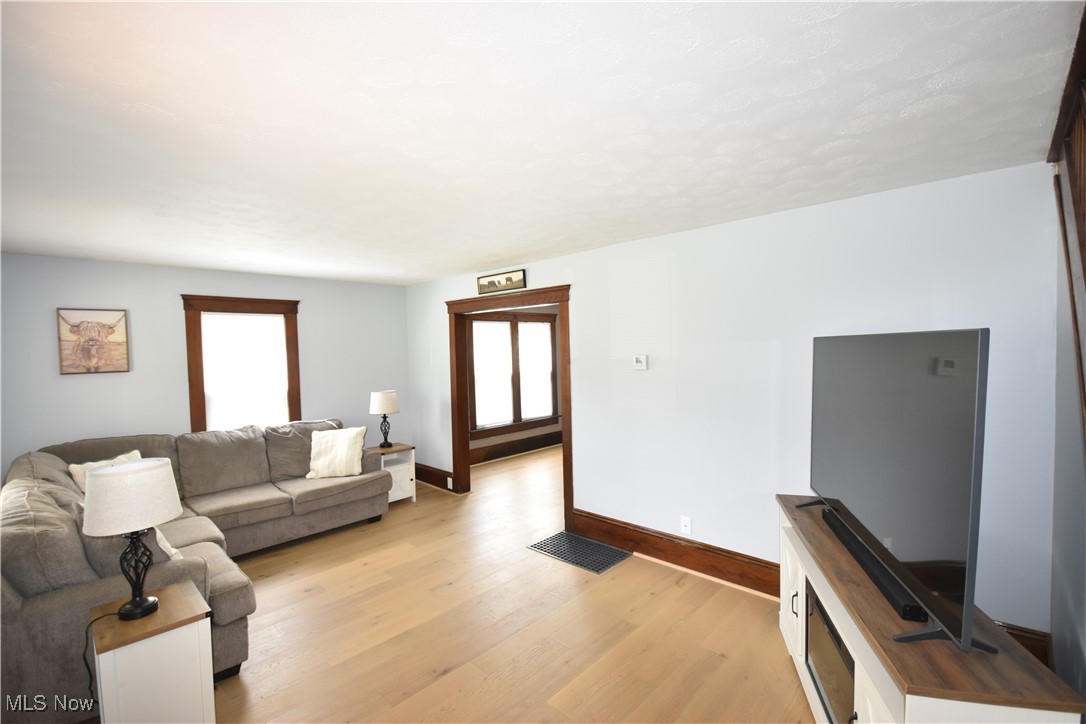 808 West Riddle Avenue Ravenna, OH 44266 - Photo 2 of 28 Living room featuring light hardwood / wood-style floors
