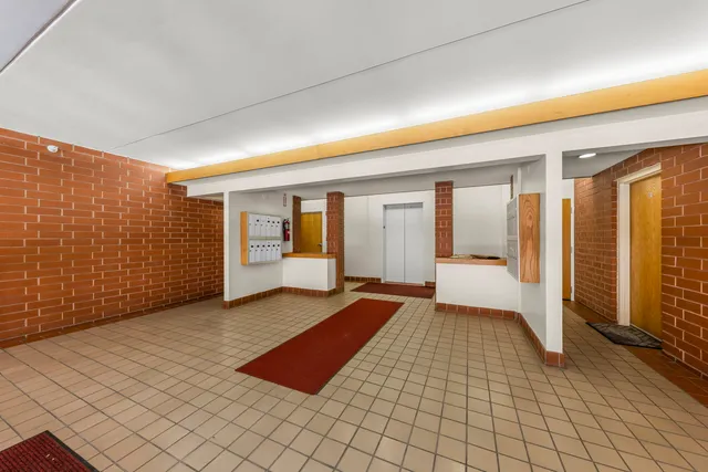 a view of a room with large window